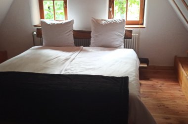 Schlafzimmer mit Bett